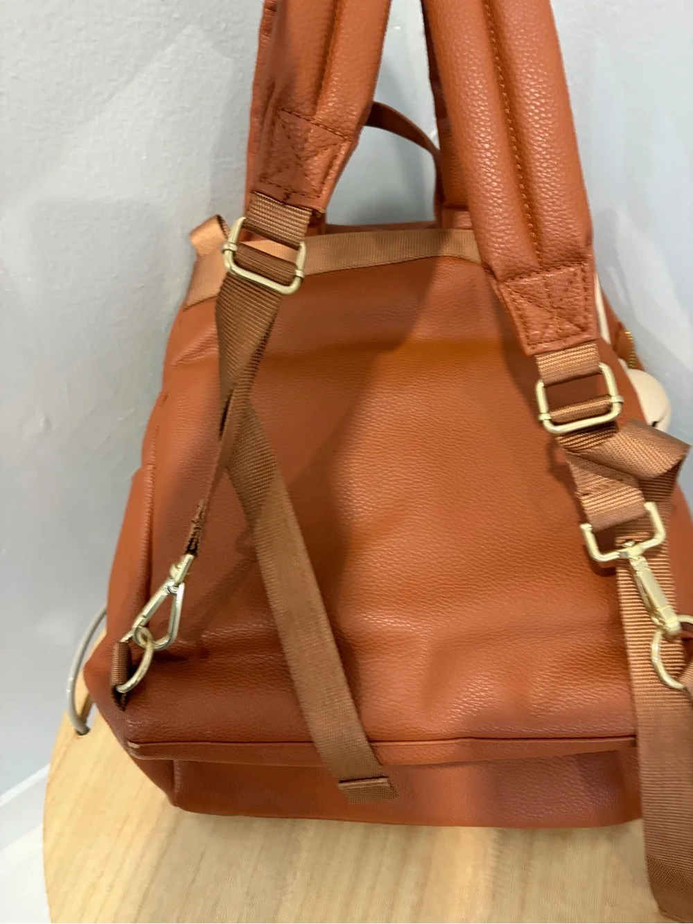 Tan Leather Backpack with Gold Accents - Brand: Unknown